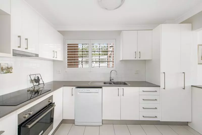 Centrally located, ground floor unit surrounded by lush gardens with large courtyard, close to clubhouse.