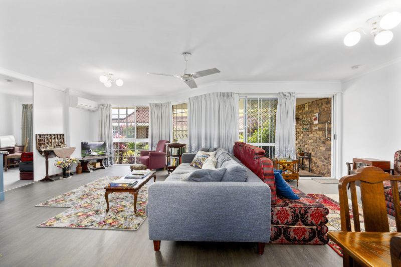 Beautiful two-bedroom, one bathroom villa with covered rear entertaining area.