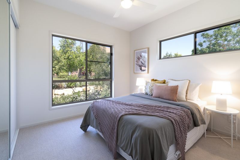 Vibrant two-bedroom villa with attached garage