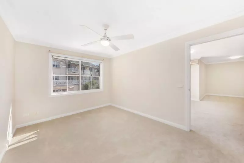 ELEVATED OVERLOOKING THE WELL MANICURED GARDENS