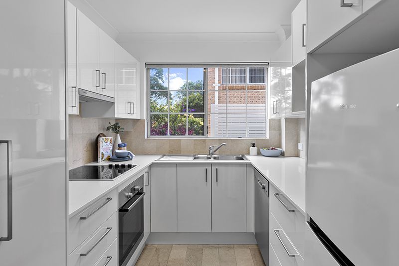 Beautifully renovated unit surrounded by lush gardens