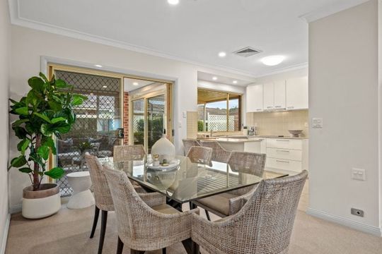East facing rear aspect with enclosed sunroom & patio area for entertaining