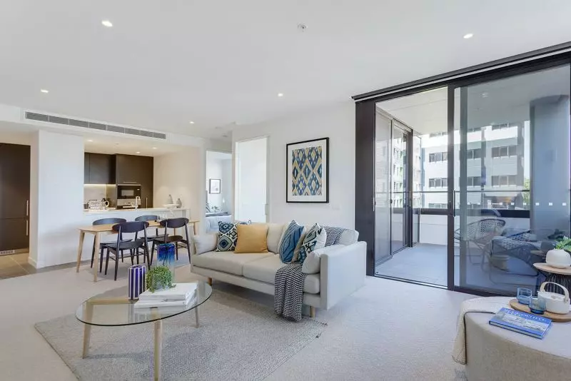 It's hardly downsizing with this three bedroom, 2 bathroom apartment in inner-city Melbourne