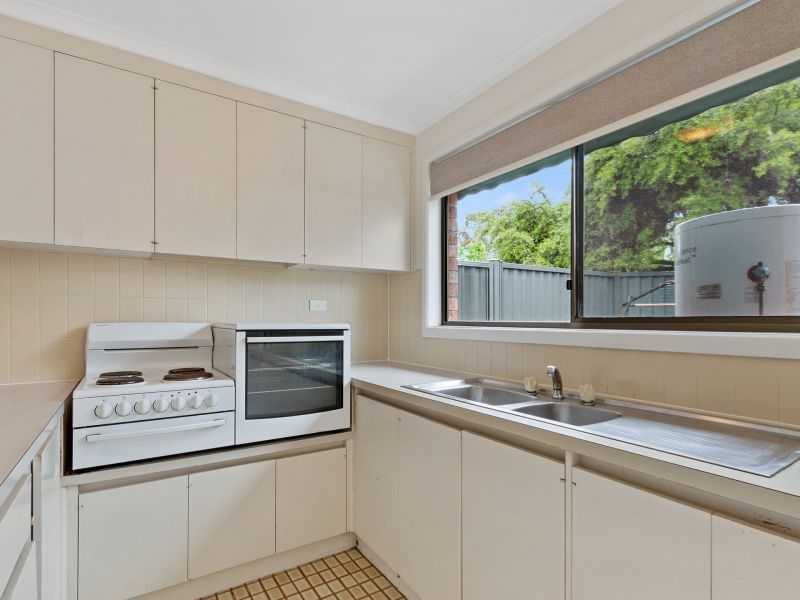 Private, Updated Unit with Courtyard in a Friendly Village Setting