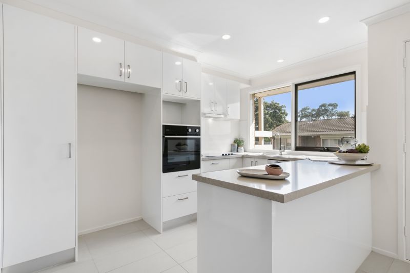 Beautifully presented two-bedroom villa with a charming spacious backyard