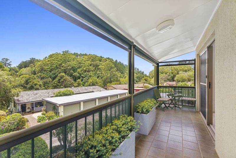 Elevated 2-bedroom villa surrounded by trees