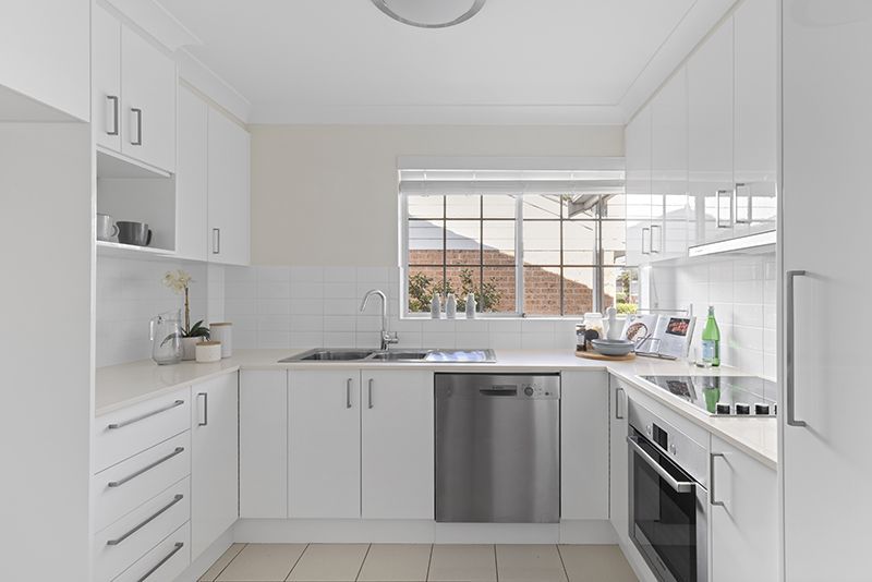 Beautifully presented unit close to clubhouse with district views.