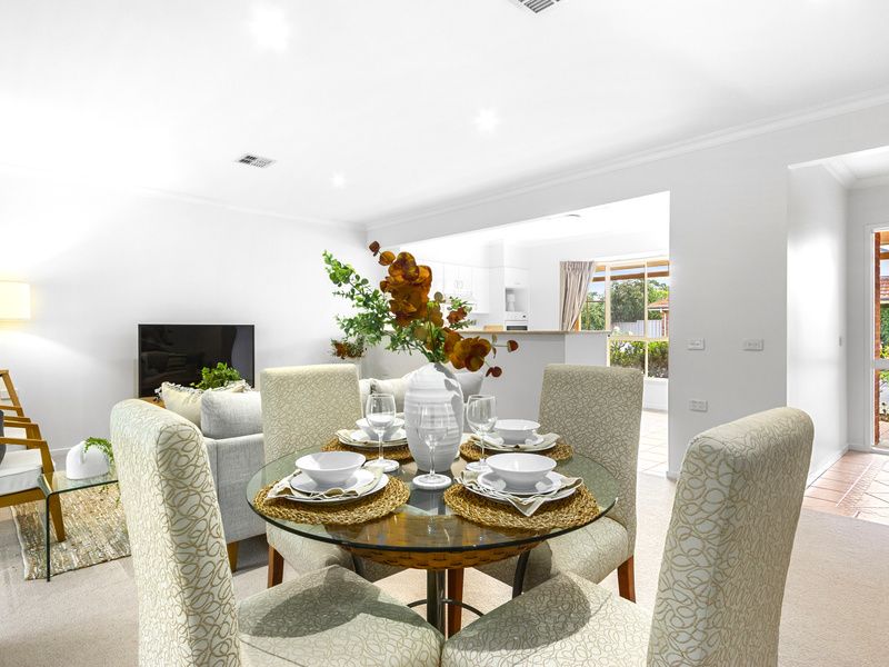 Light-Filled Living with Sunroom and Private Courtyard