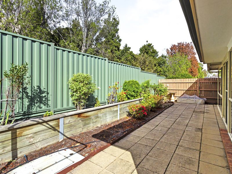 Light-Filled Living with Sunroom and Private Courtyard
