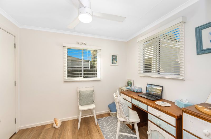 Coastal Gem! Stylish Updates & Serene Green Space