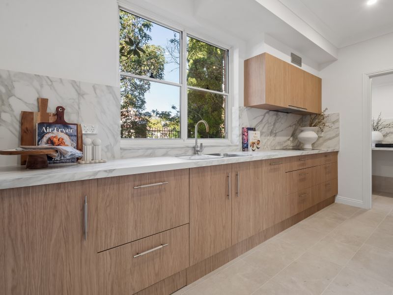 Contemporary three-bedroom apartment in a prime village setting
