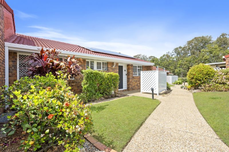 Beautiful two-bedroom, one bathroom villa with covered rear entertaining area.