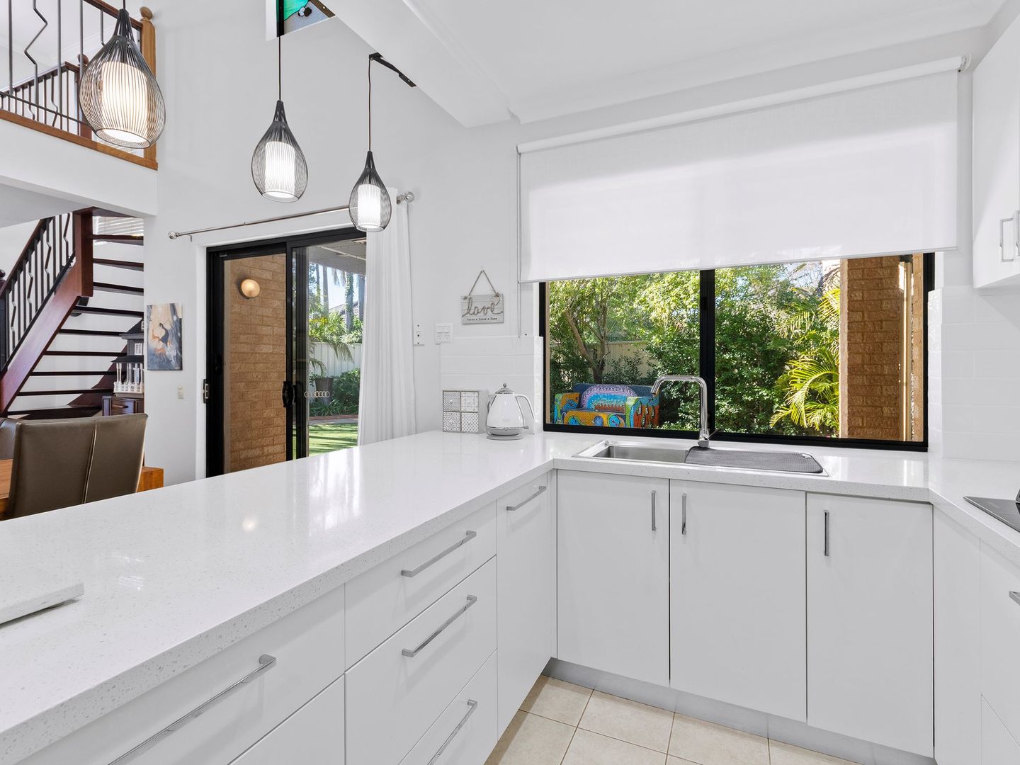 Spacious, renovated living with sanctuary gardens