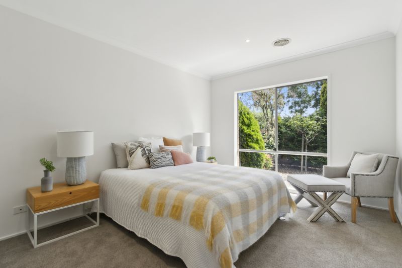 Enjoy serene living in this modern two-bedroom villa