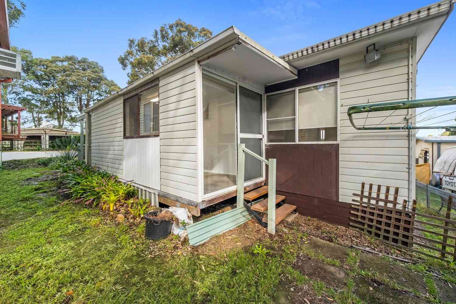 Tranquil Three-Bedroom Home with Sunroom