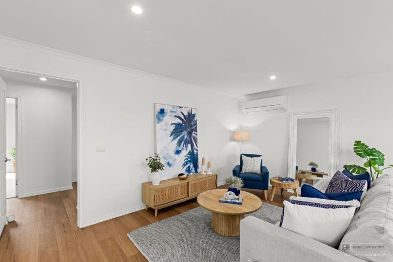 Beautifully Refurbished Two-Bedroom Home Opposite the Community Centre