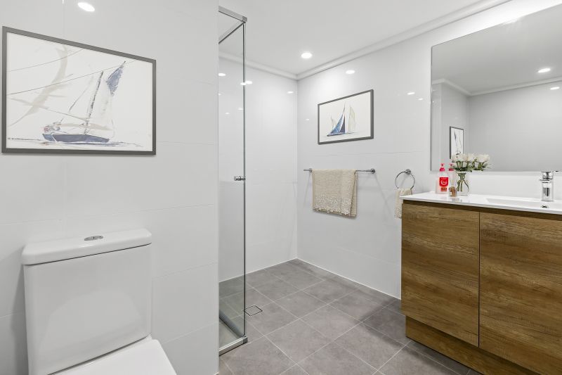 Centrally located, renovated ground floor unit surrounded by lush gardens with large courtyard.