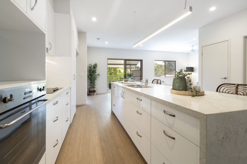 Vibrant two-bedroom villa with attached garage