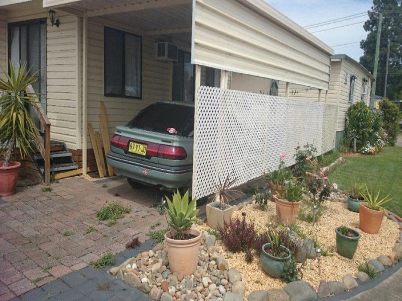 Lovely sunny 2 bedroom home. Easy access into a  large carport.