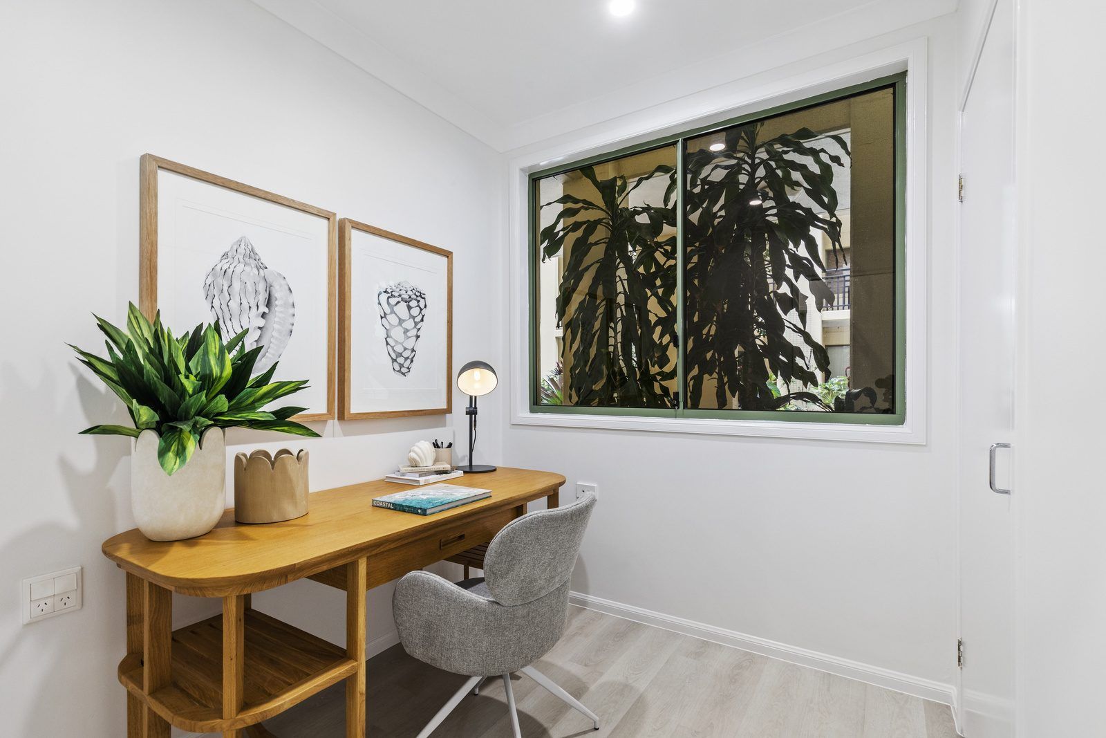 Modern one-bedroom apartment with large balcony.