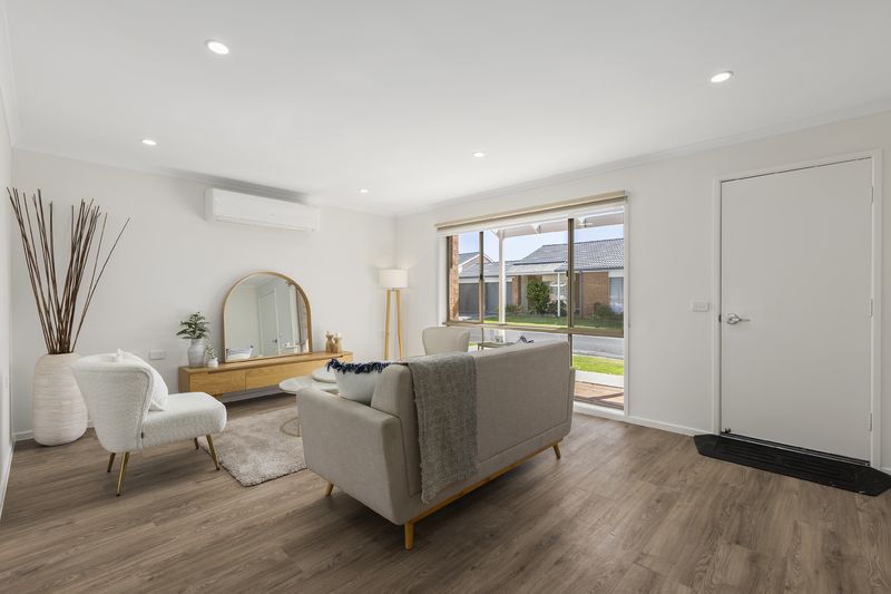 Stylish, Sunlit Unit with Private Backyard and Modern Upgrades