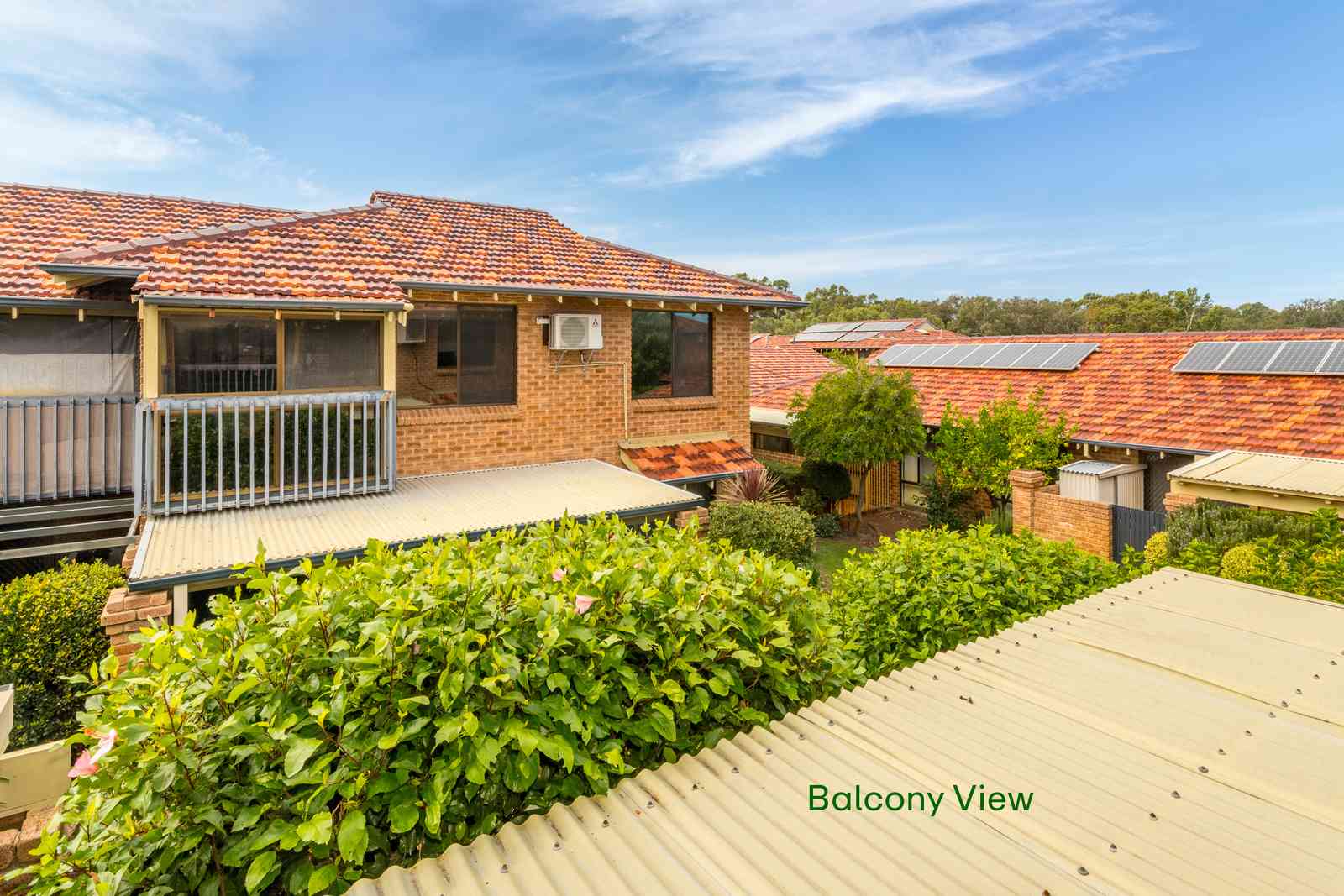 Freshly updated villa with garden views & sunny east-facing balcony