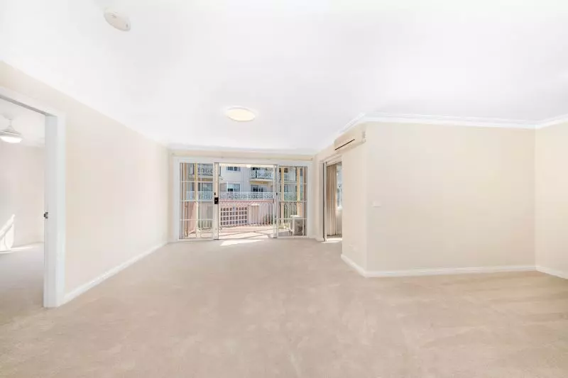 ELEVATED OVERLOOKING THE WELL MANICURED GARDENS