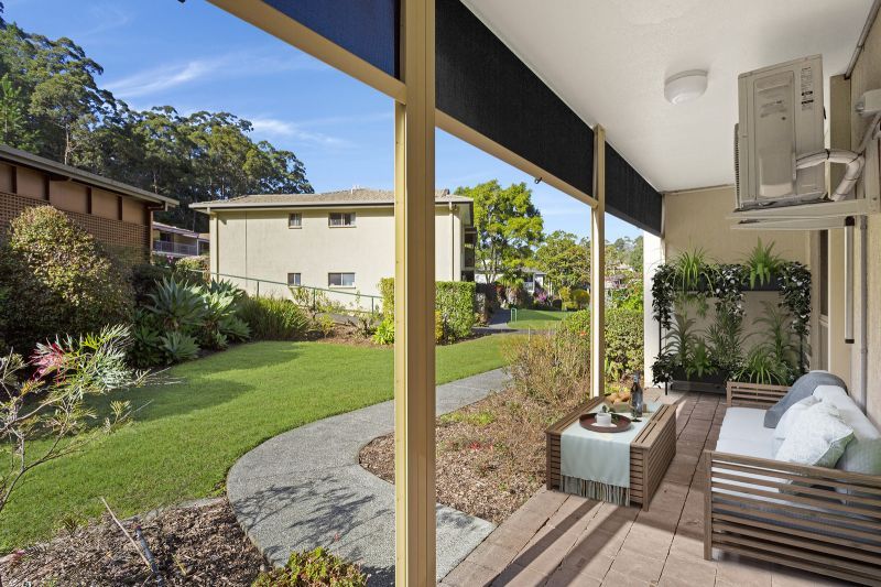 Modern ground-floor 2-bedroom villa with garden views