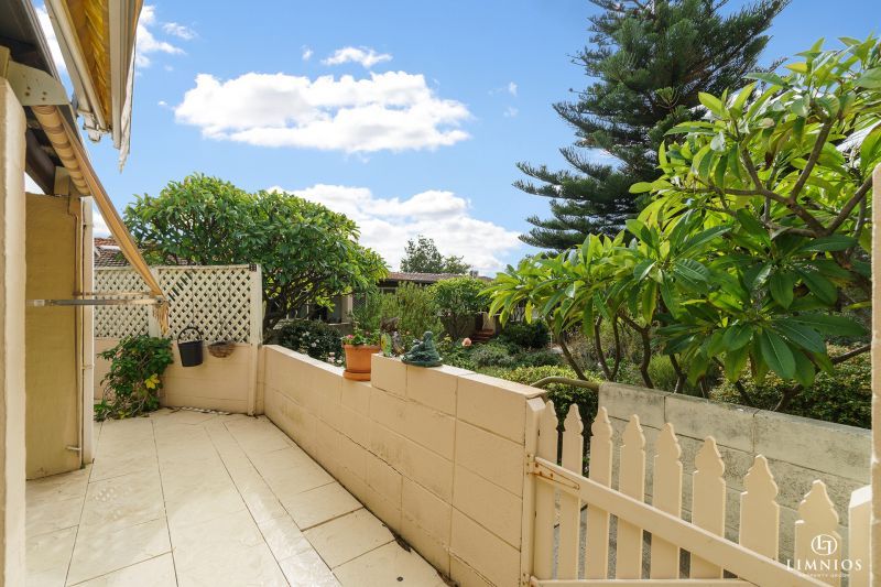 SOLD! A bright, light filled unit with a sunroom and leafy outlook