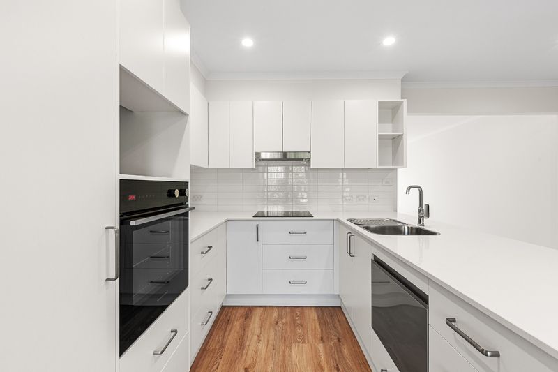 Spacious, Fully Renovated Unit in Peaceful Village Pocket