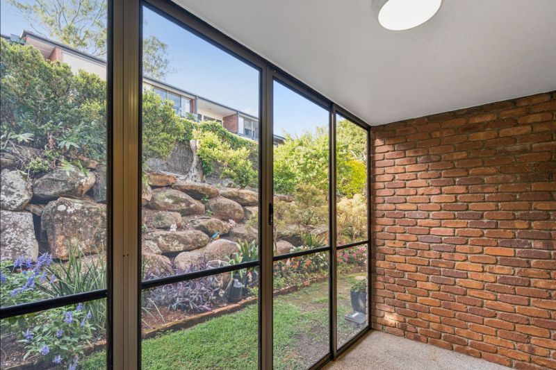 Ground-level studio apartment with enclosed patio