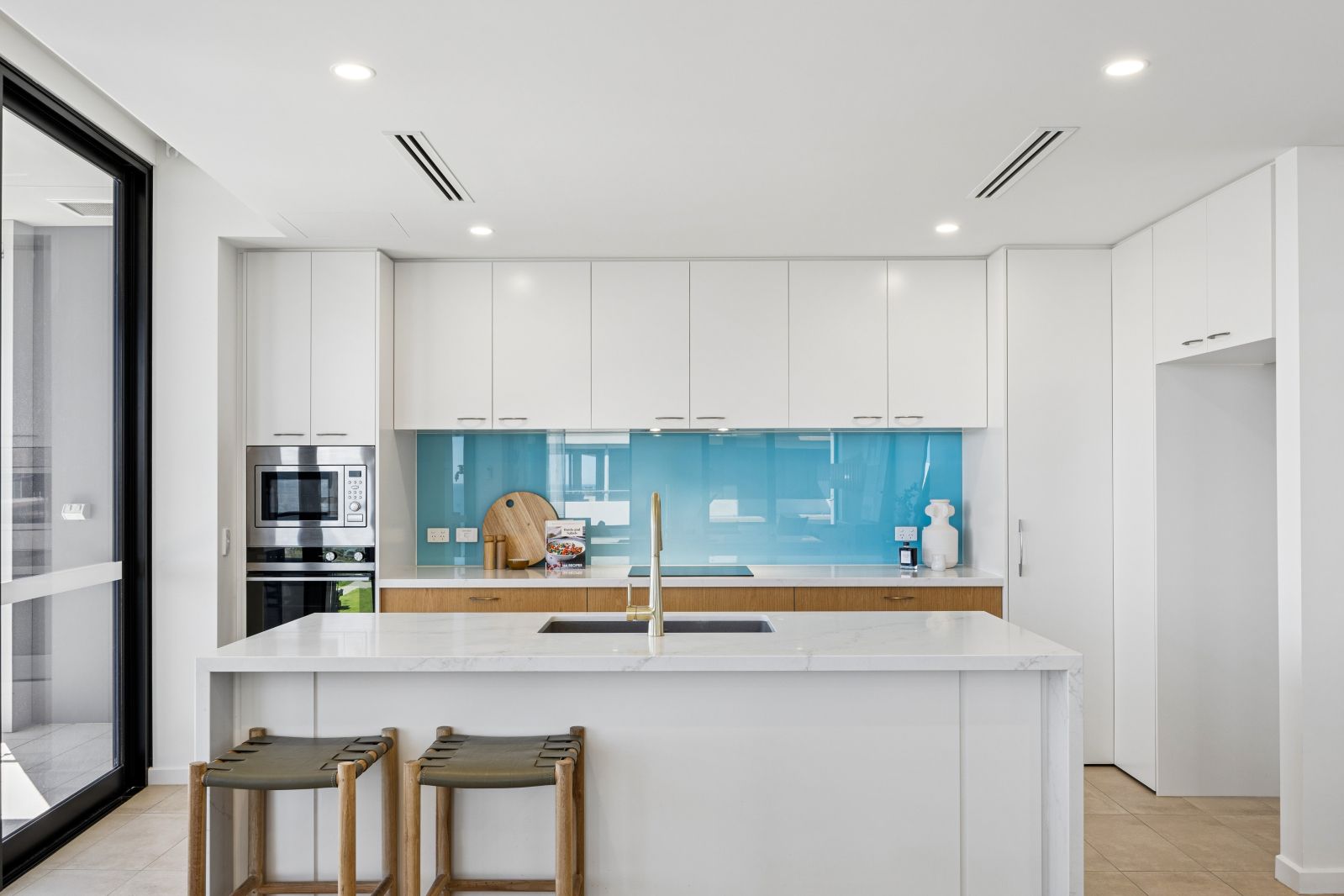 Experience exclusive beachfront living in this luxurious apartment, with breathtaking views from the hills to the sea, within this secure community