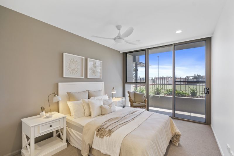 Light-filled north-facing terrace with bowling green views