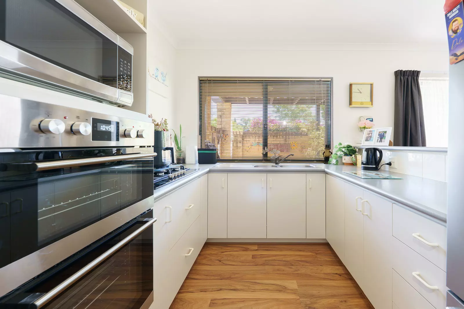 Light-filled corner home with garden views & north-facing courtyard