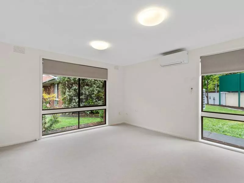 Private, Updated Unit with Courtyard in a Friendly Village Setting