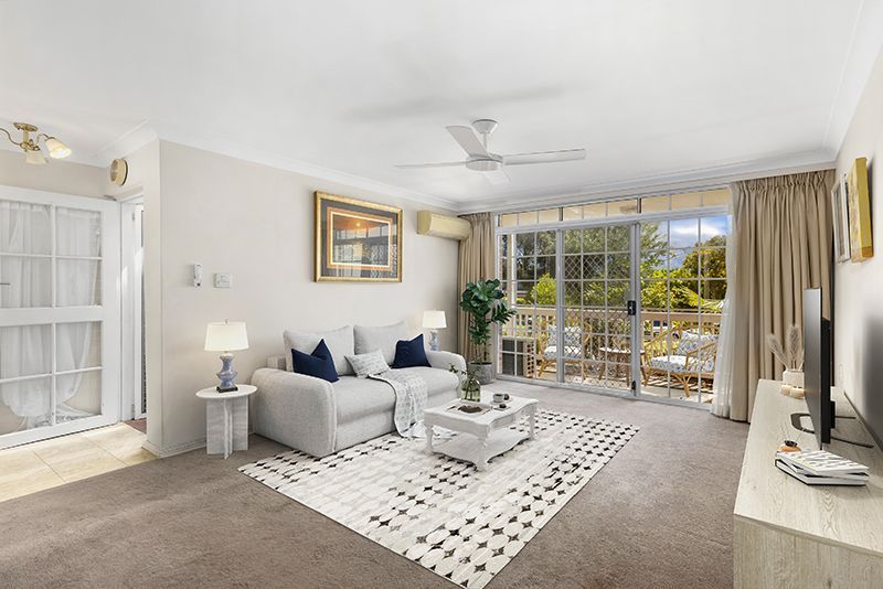 Well maintained, light-filled,  ground floor unit surrounded by gorgeous gardens.