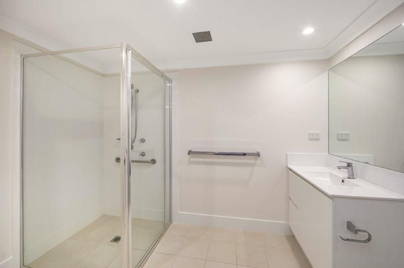 Spacious, Modern Apartment with Private Courtyard and Support Services