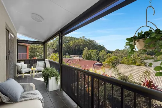 Elevated 2-bedroom villa with scenic views of the trees