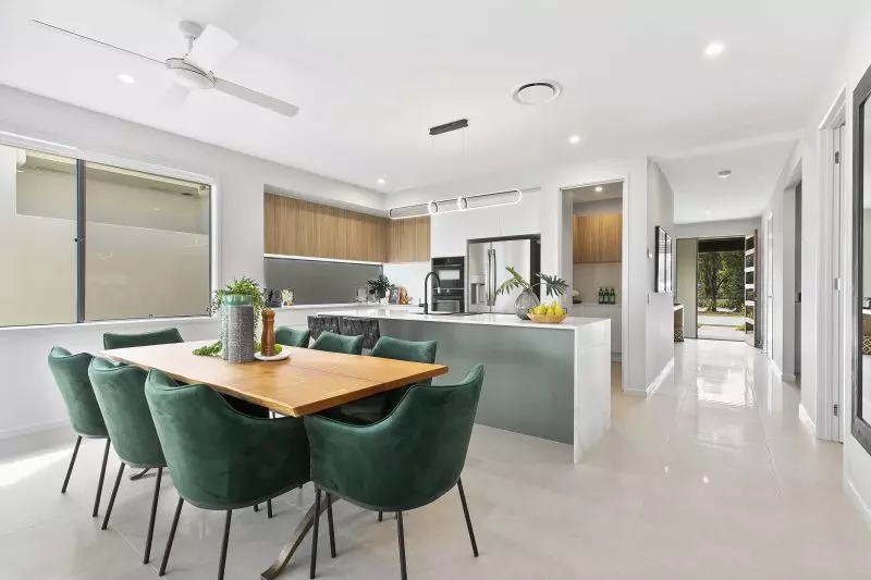 STUNNING DISPLAY HOME FACING TRANQUIL LAKE