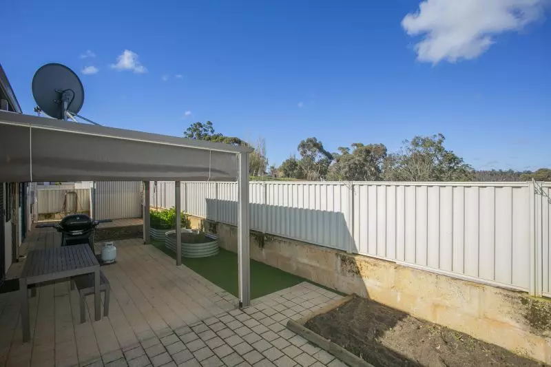 Open plan living situated on a large, elevated block.