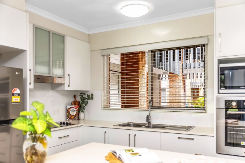 Secure Parking, Low Maintenance Unit Ground Floor Living with Modern Finishes!