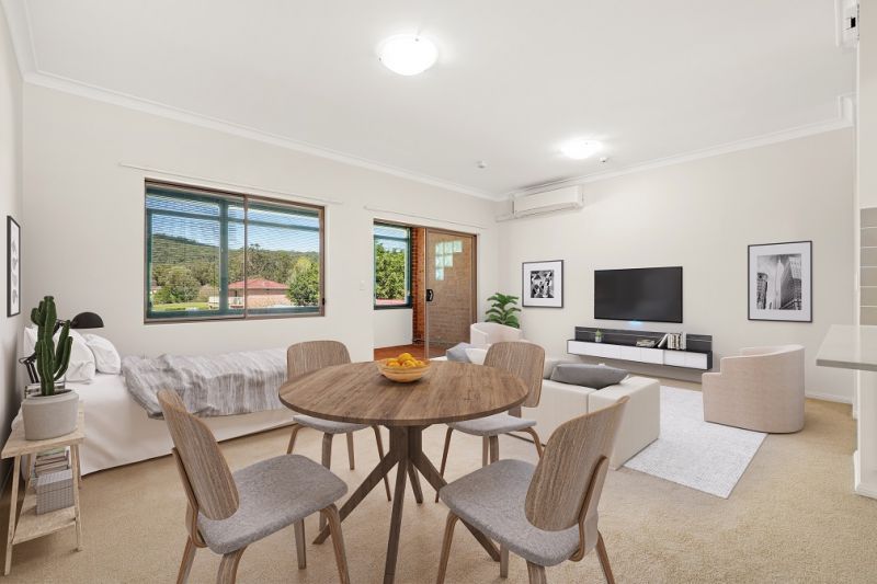 Ground floor studio apartment with east facing enclosed balcony