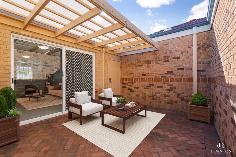 SOLD.  Live your best life in this light & bright villa in a fabulous coastal location!