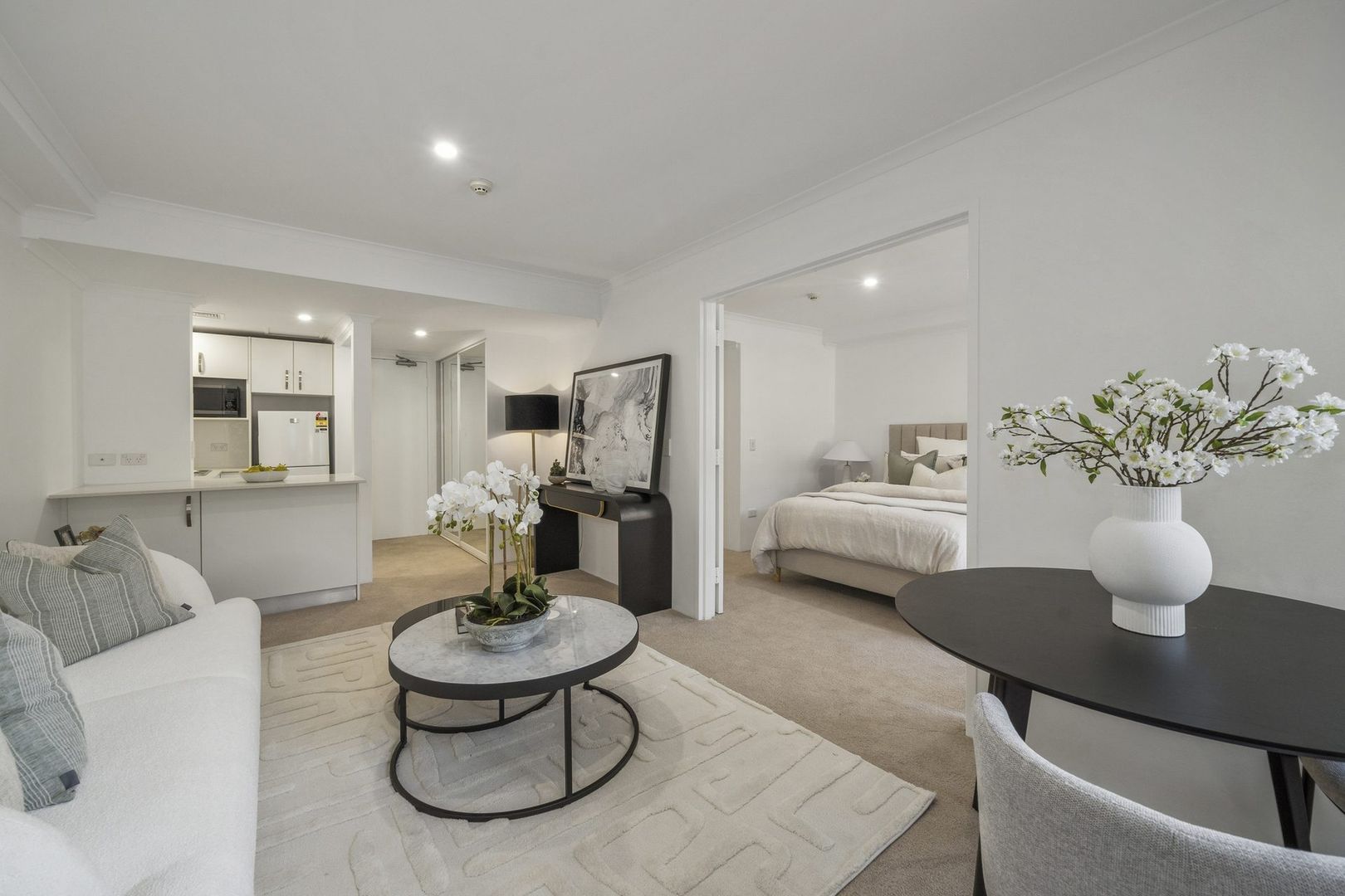 A serviced apartment surrounded by garden greenery