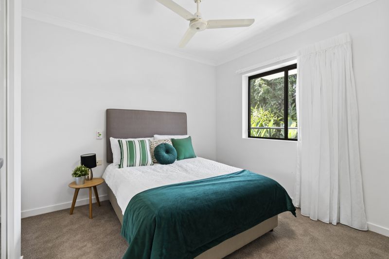 Elevated one-bedroom apartment in peaceful green setting