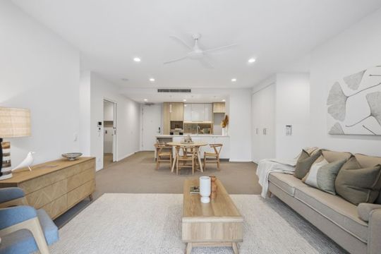Elegant two-bedroom apartment with peaceful, tree-lined outlooks