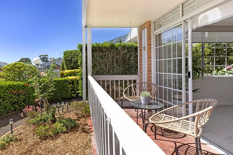 Surrounded by lovely gardens, beautifully renovated ground floor sun-filled unit, right opposite the croquet lawn.