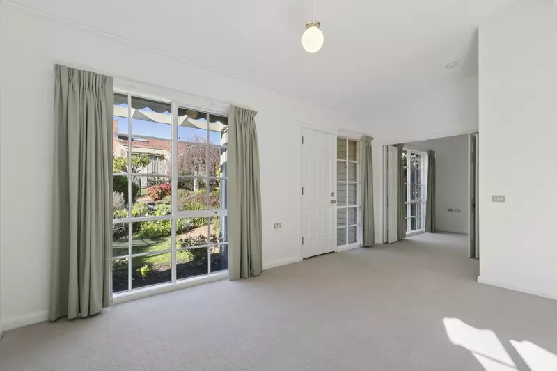 Village Heart Retreat with Vaulted Ceilings and Courtyard