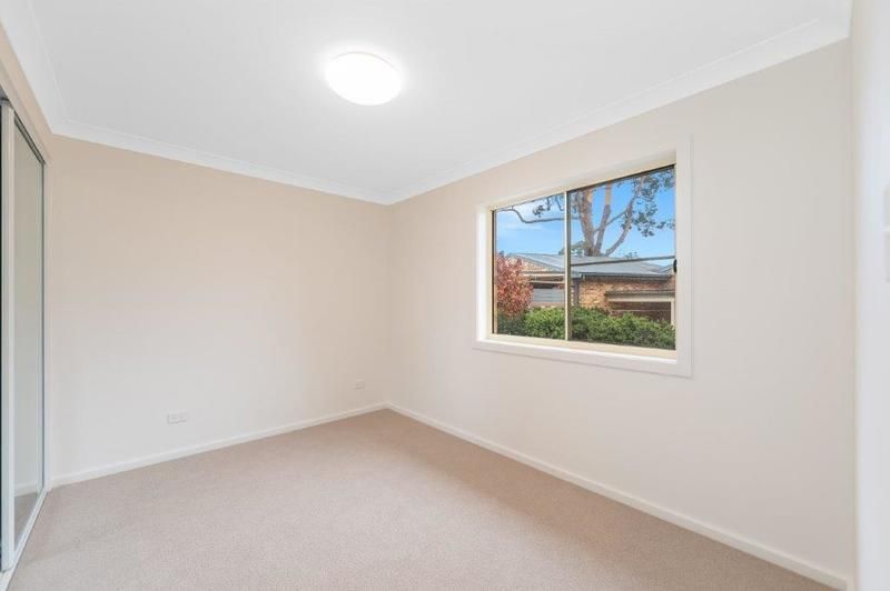 Modern, Spacious Living with Large Sunny Courtyard and Single Garage