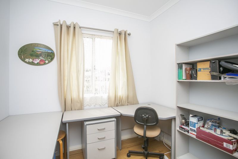 Front & Centre! 2 bed, 2 bath plus study with beautiful pond views